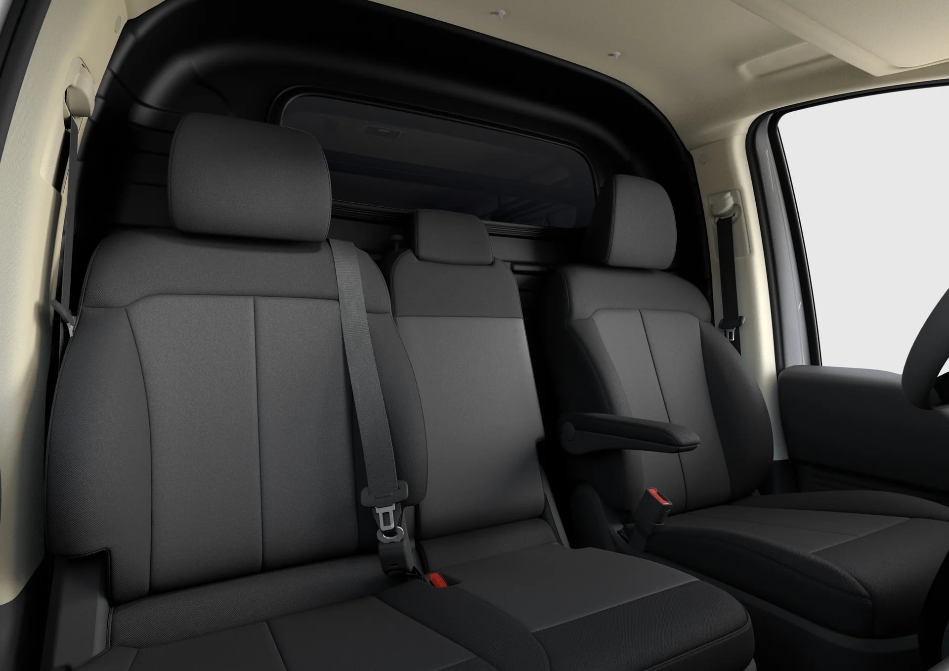 Tre framsäten i grått tyg i Hyundai STARIA Cargo med skiljeväggen bakom